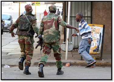 Which Zimbabwean individuals and companies have been sanctioned by the USA / UK?